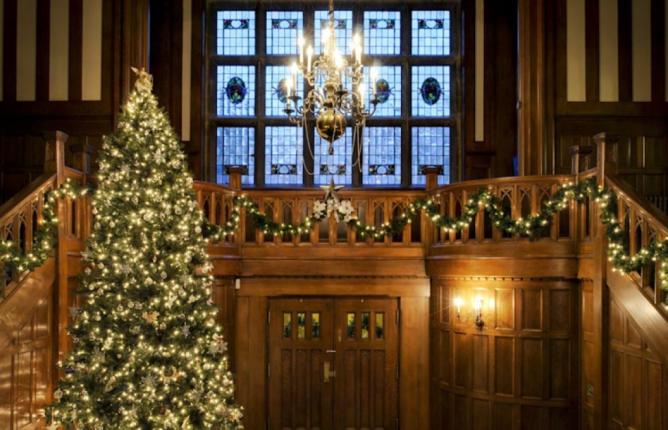 Cozy up at the Castle The entrance to Hatley Castle alight with the glow of candles, tree lights and the chandelier.